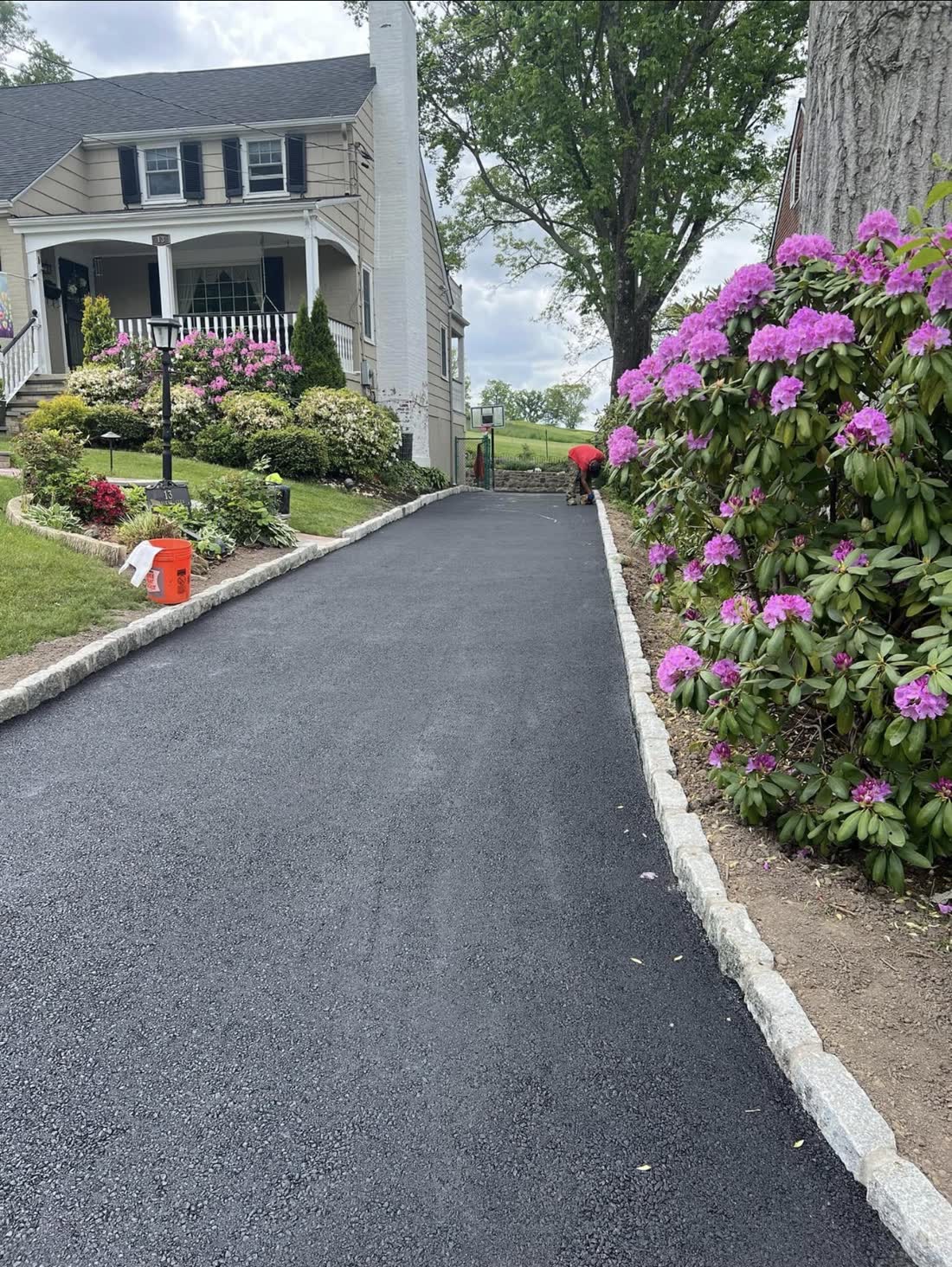Asphalt driveway edged with Belgian block