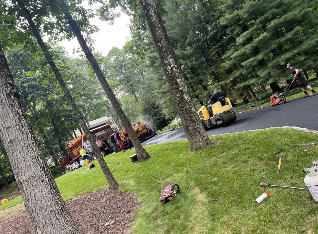 Paving crew finishing a New Jersey parking lot